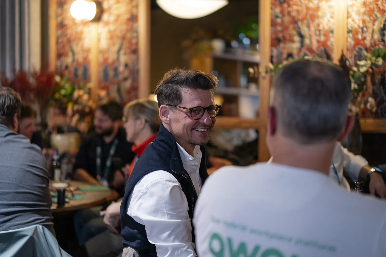Guests in conversation at the Oslo Proptech Summit 2026 mingle