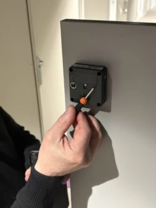 Unscrew and remove the battery latch