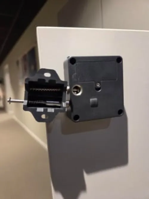Stuck lock pin on a smart locker door