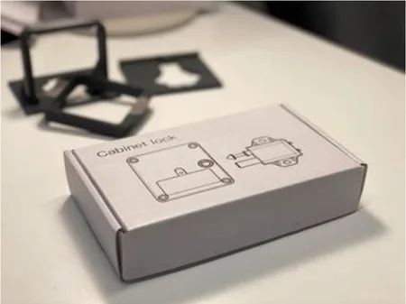 Unboxed Awaio cabinet lock kit: lock body, pin, screws, and mounting templates