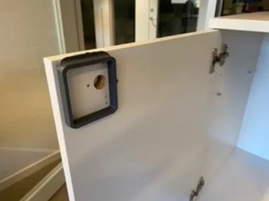 Step 8: locker template temporarily stuck to the door